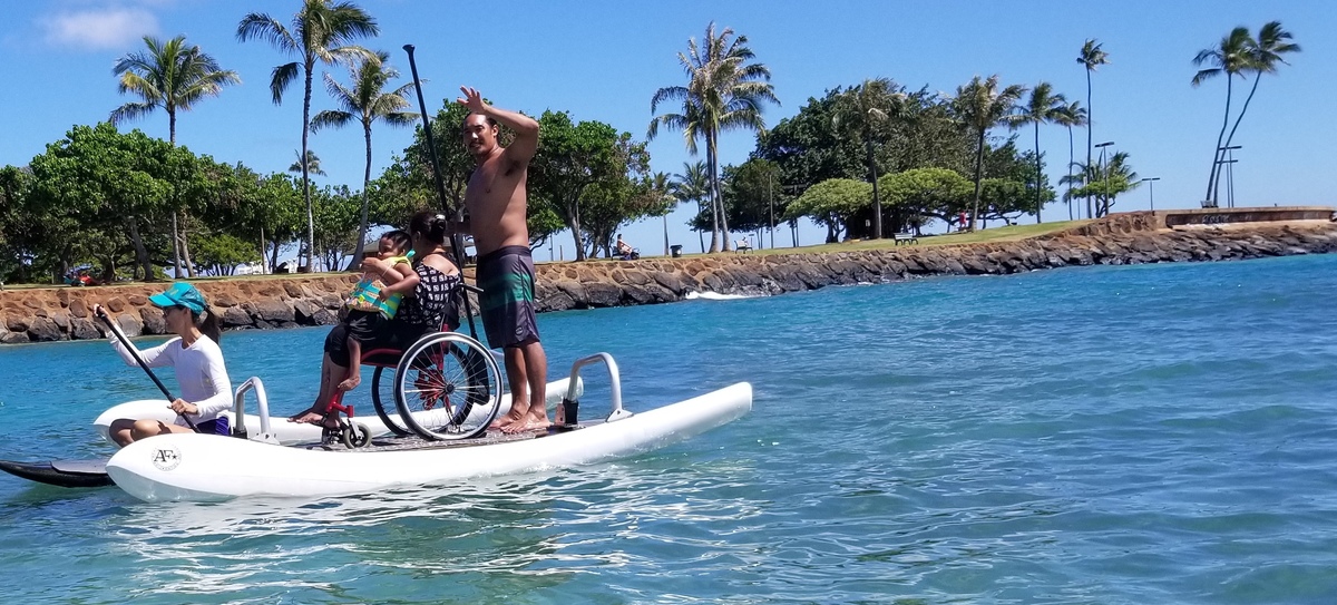 Adaptive Freedom Foundation Paddle Day with Muscular Dystrophy Association Banner