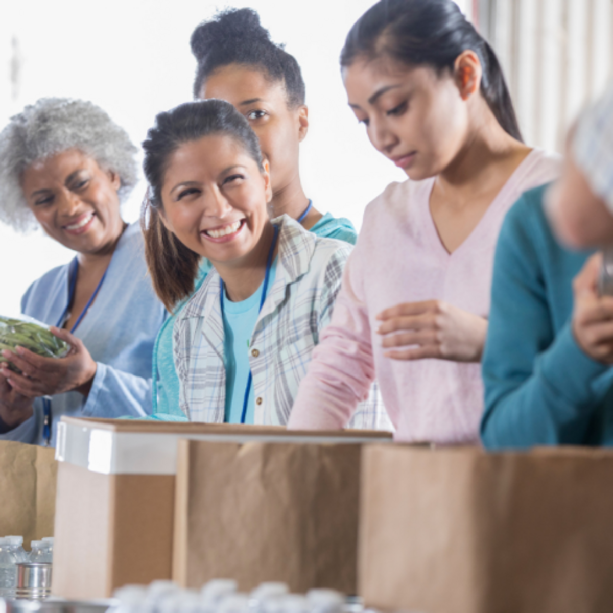 Pack feminine hygiene bags for homeless & low-income women  Banner